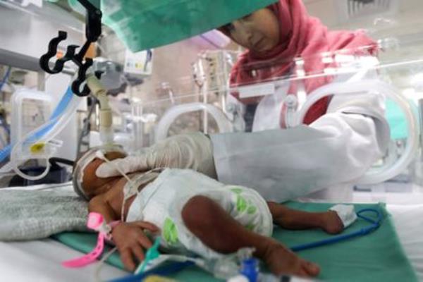 A nurse cares for a premature baby in the neo<em></em>natal unit of Gaza's Shifa hospital on October 22.